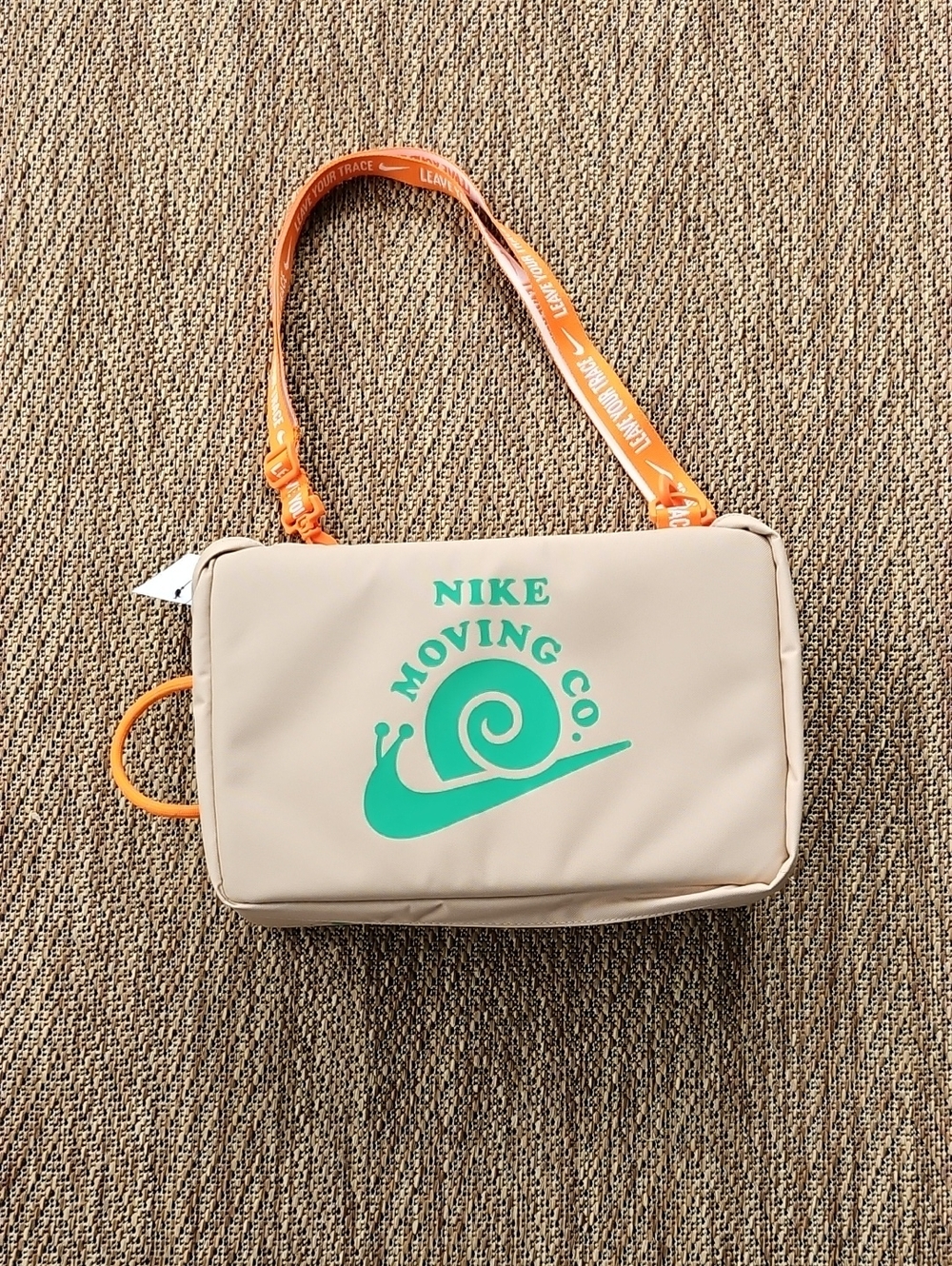 Nike Beige Crossbody Bag with Teal Logo and Orange Strap